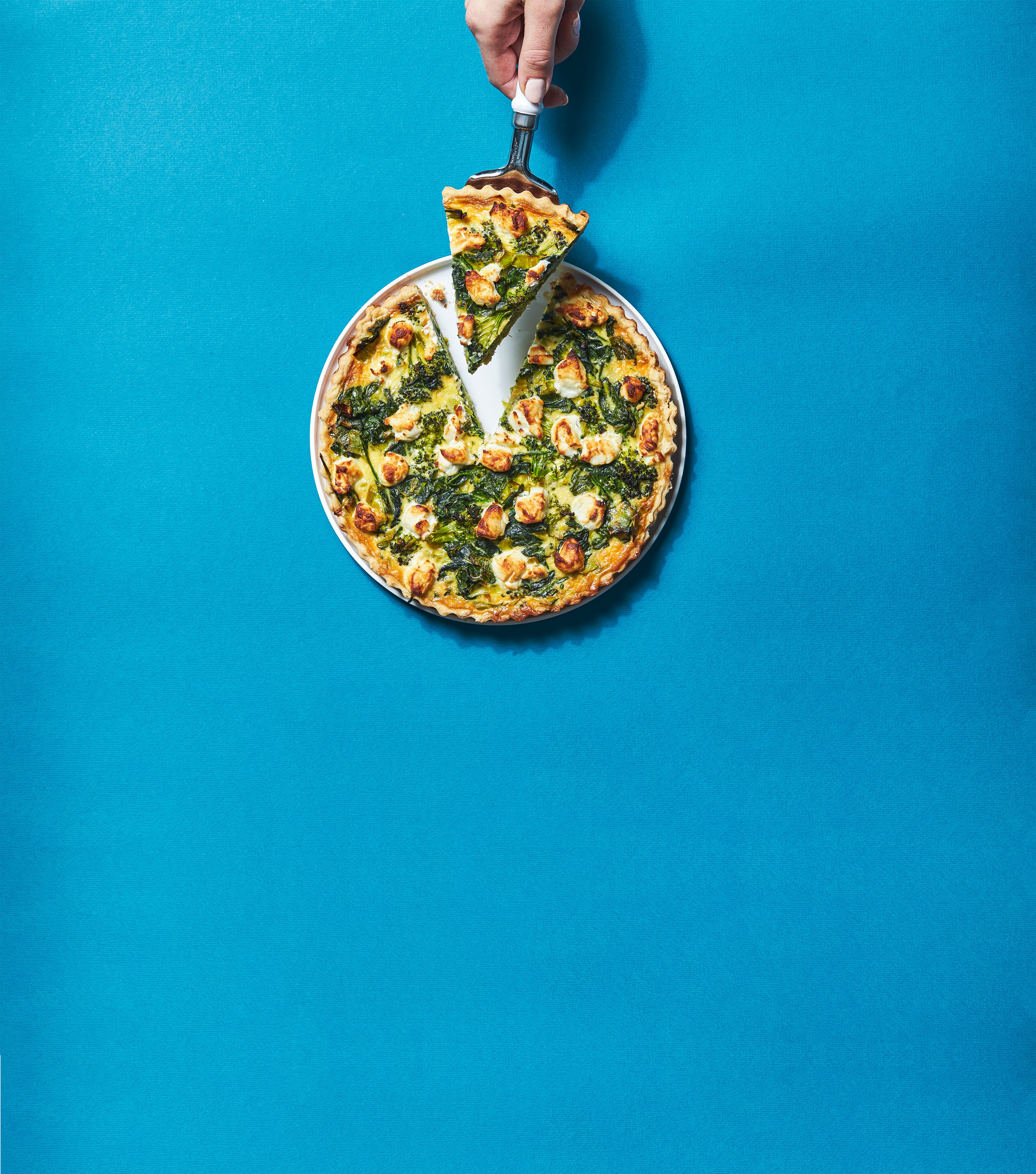 Groene groentequiche met geitenkaas